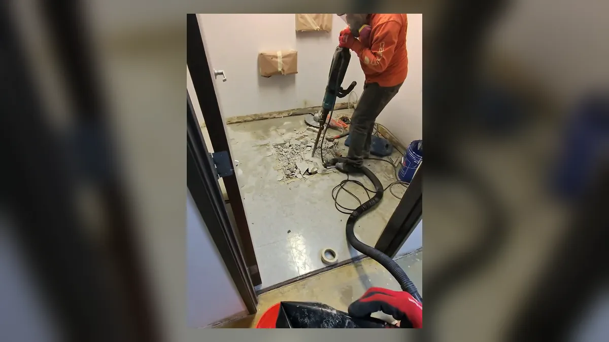 drain cable machine clears a floor opening during a commercial bathroom project for drain cleaning & unclogging in maricopa, az in Maricopa