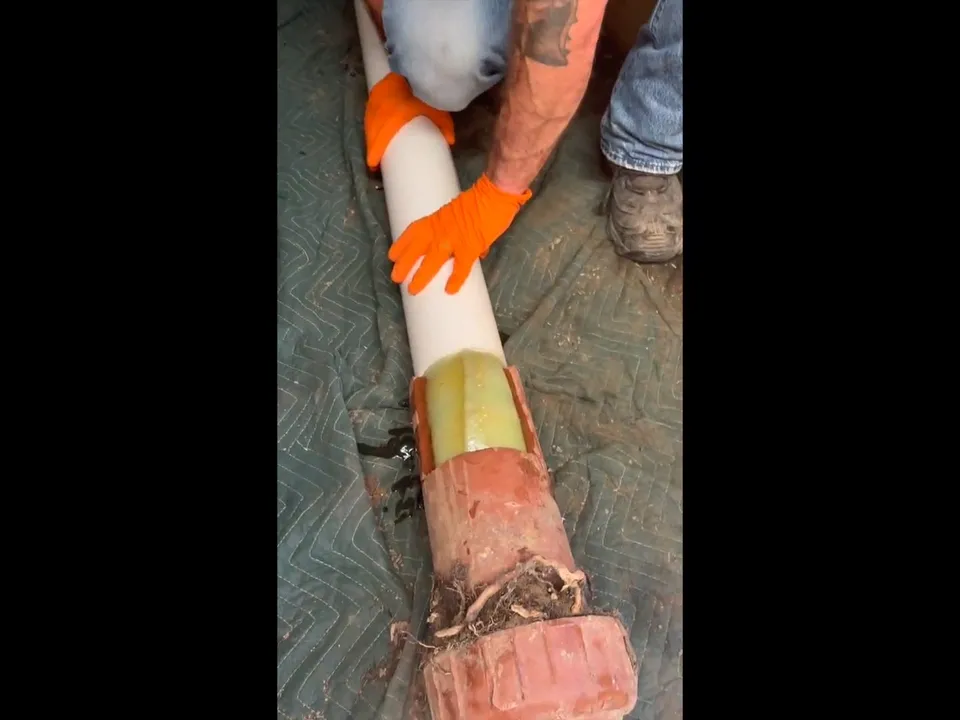 resin-saturated liner is wrapped around an old underground pipe during a plumbing service call in Maricopa, AZ