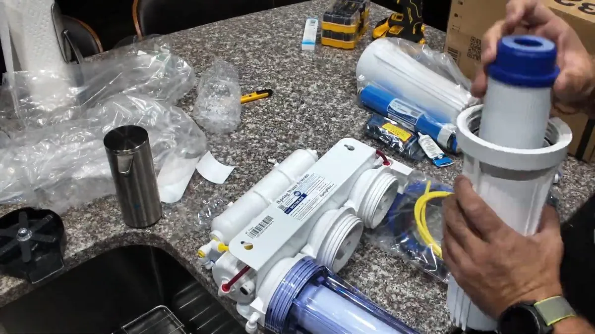reverse-osmosis membrane cartridge is fitted into an under-sink system for reverse osmosis installation in maricopa, az in Maricopa