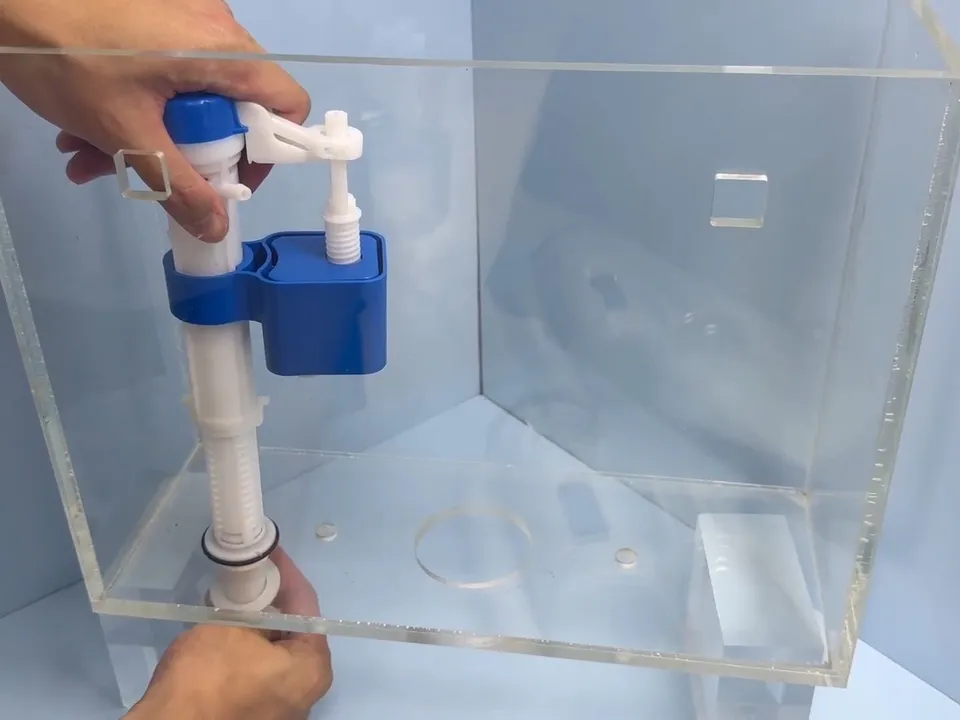 blue-and-white fill valve is installed inside a clean toilet tank for toilet repair & installation in maricopa, az in Maricopa