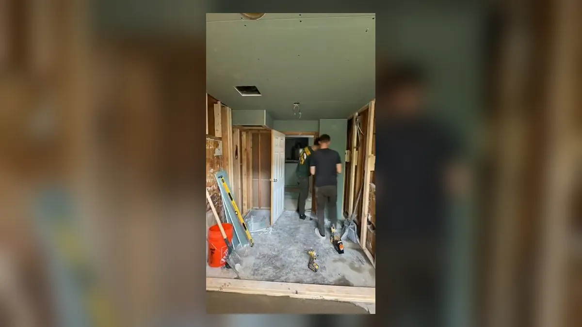 bathroom renovation corridor is open to framing before new fixtures are installed illustrating Walk-In Shower Conversions in Province, Maricopa: What the Plumbing Scope Actually Involves