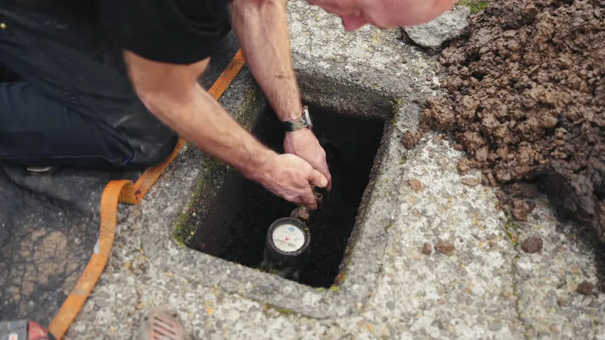 buried water or sewer connection is accessed through a square concrete opening for water line repair & replacement in maricopa, az in Maricopa