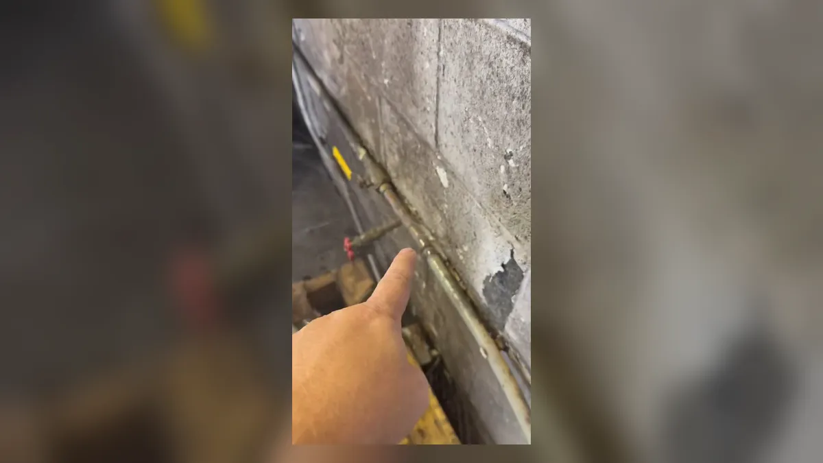 leaking water line is exposed in a narrow vertical wall channel for water line repair & replacement in maricopa, az in Maricopa