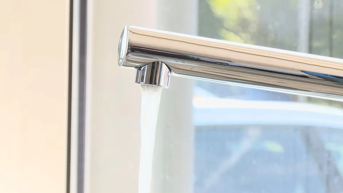 clean chrome drinking-water faucet stands beside a kitchen sink illustrating Water Softener Installation Cost in Maricopa, AZ: 2025 Price Guide